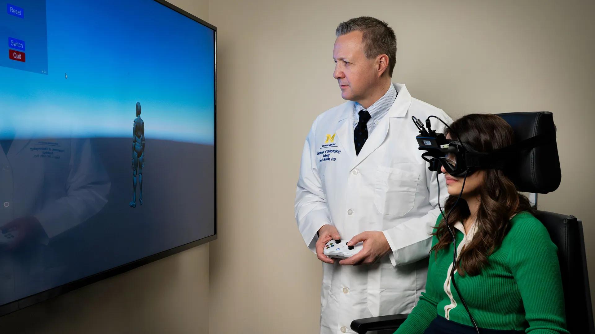 Dr. McCaslin and team member using AI technology