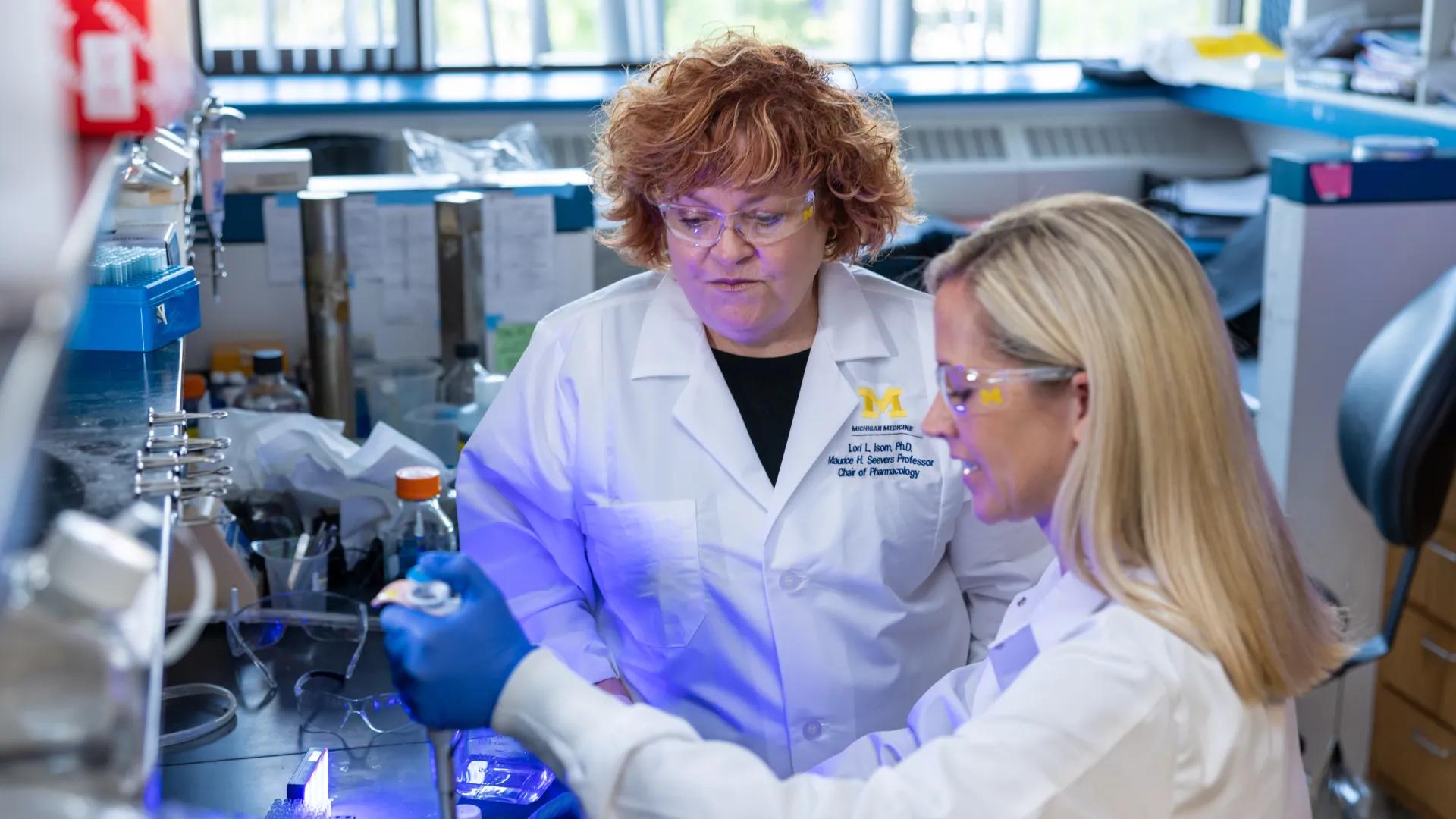 Dr. Isom and team member in the lab