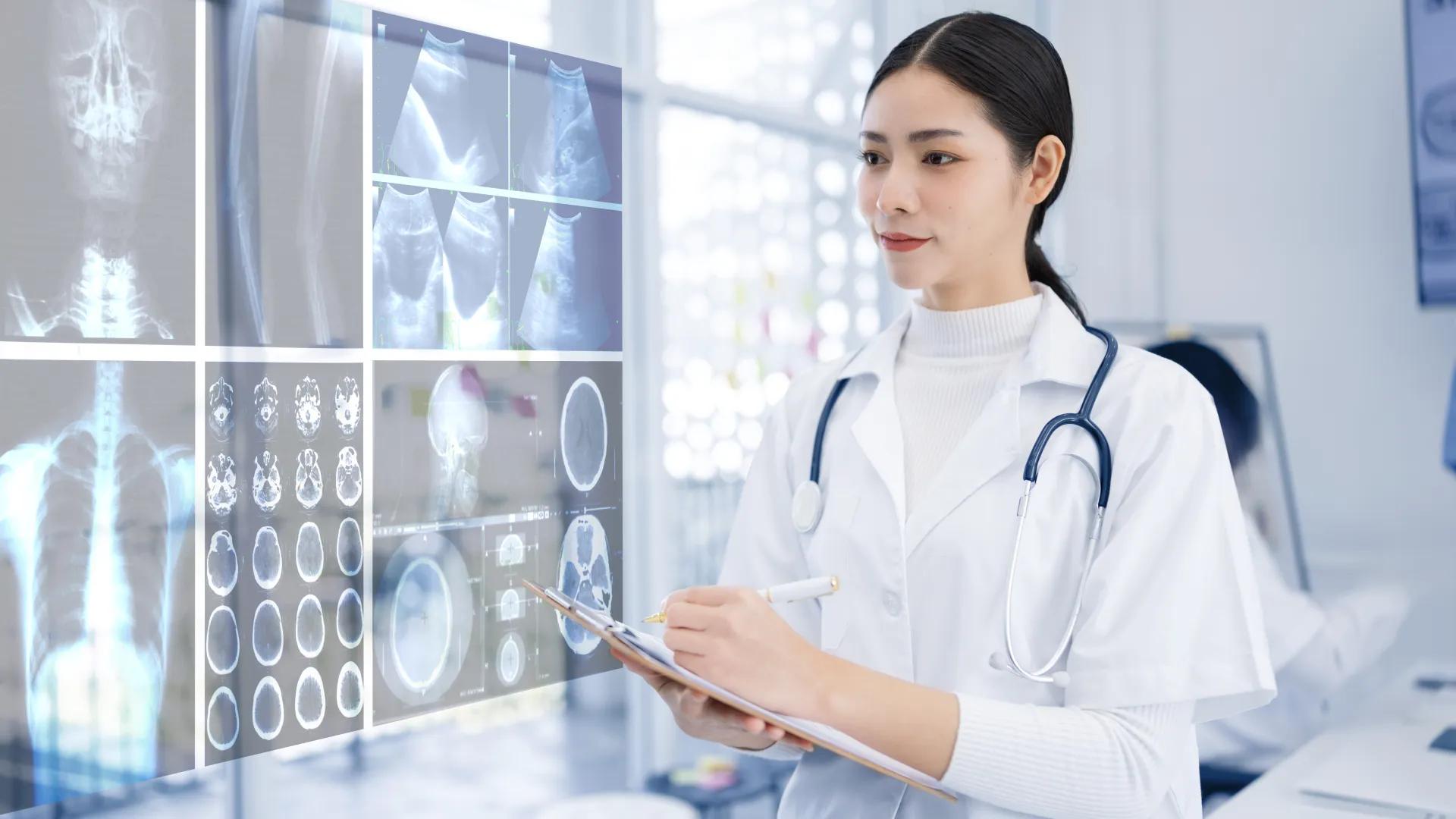 Female doctor evaluating screens