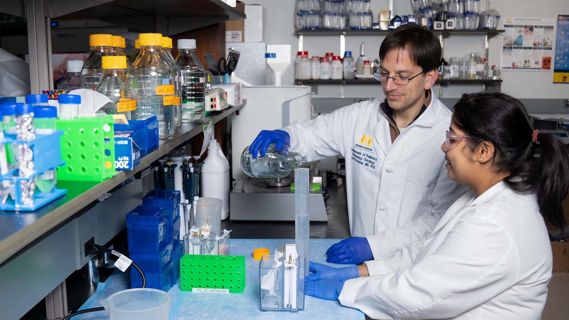 Researchers conduct laboratory work to advance pediatric brain tumor research.