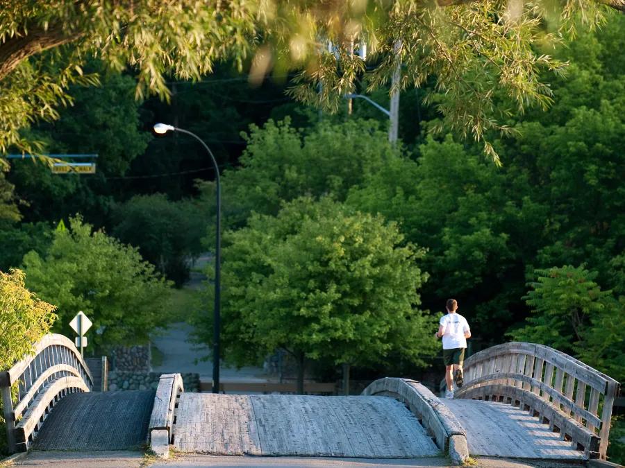 a runner on a bridge