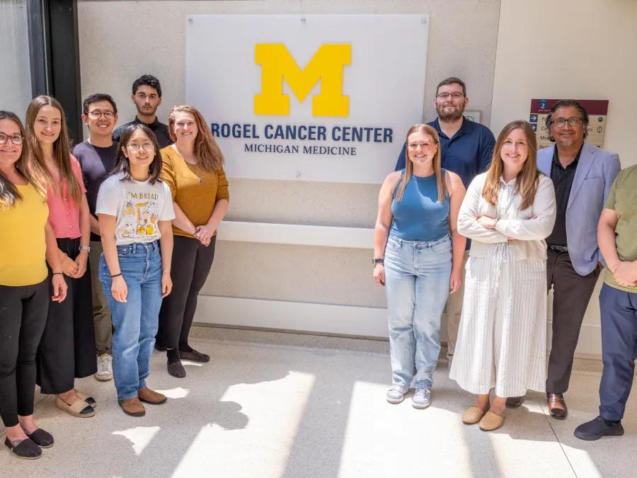 Group photo of the Genetic Medicine team standing together at the Rogel Cancer Center