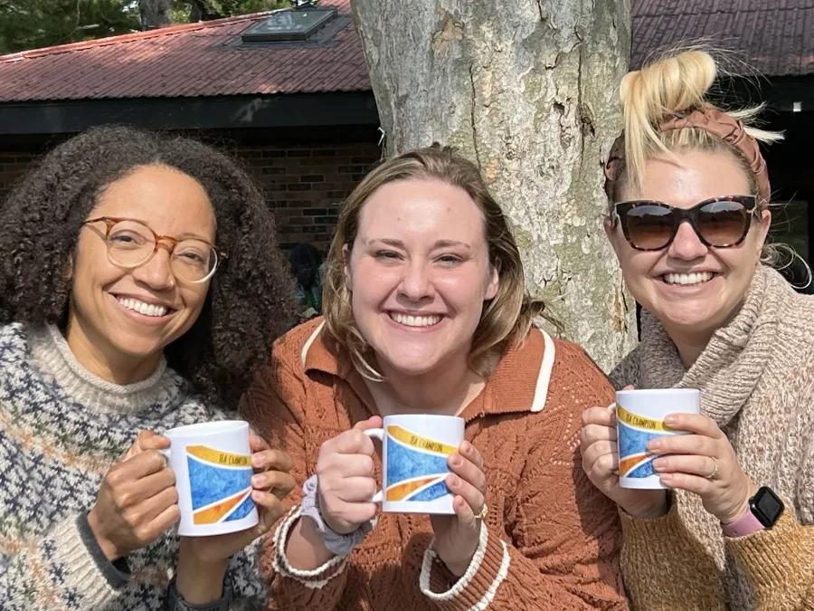 Psychiatry residents holding matching coffee mugs