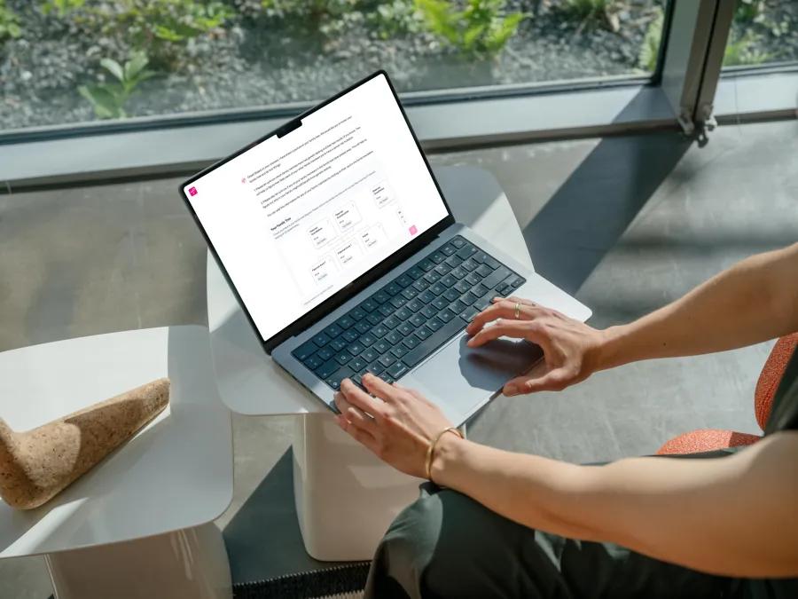 close-up for a person using ProAct on a laptop