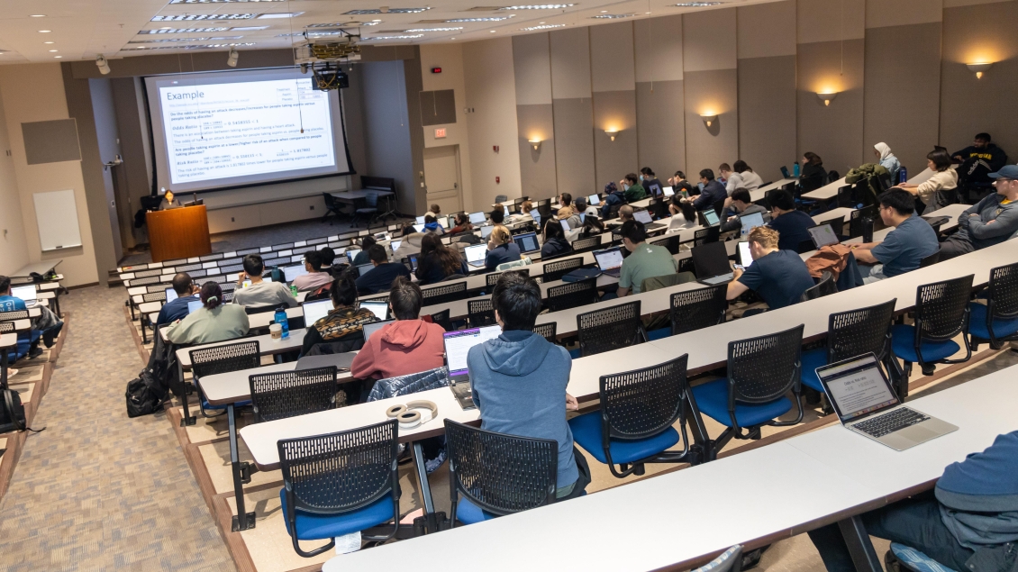 Classroom amphitheater with instructor and students