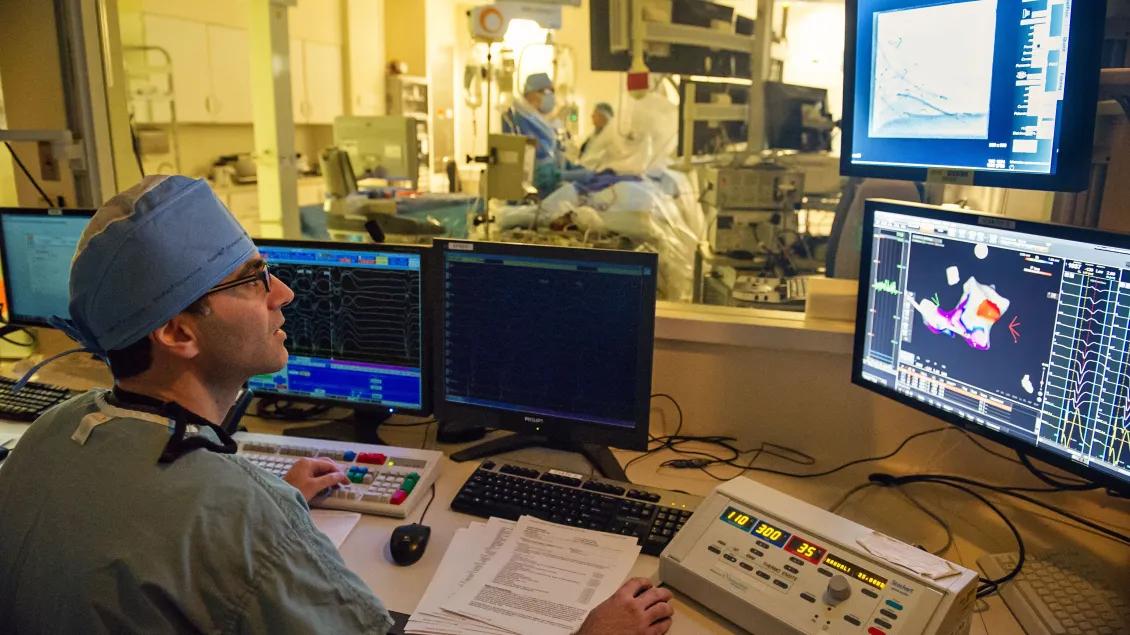 doctor reading scans in the cardiac unit 