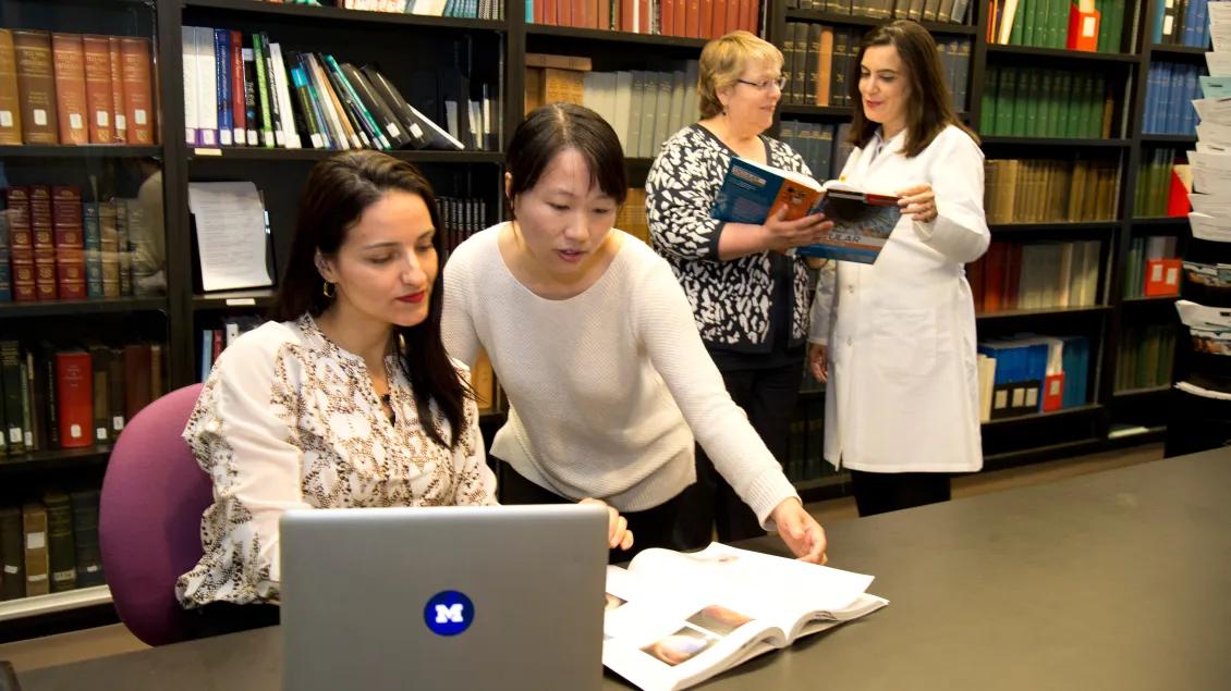 women in library