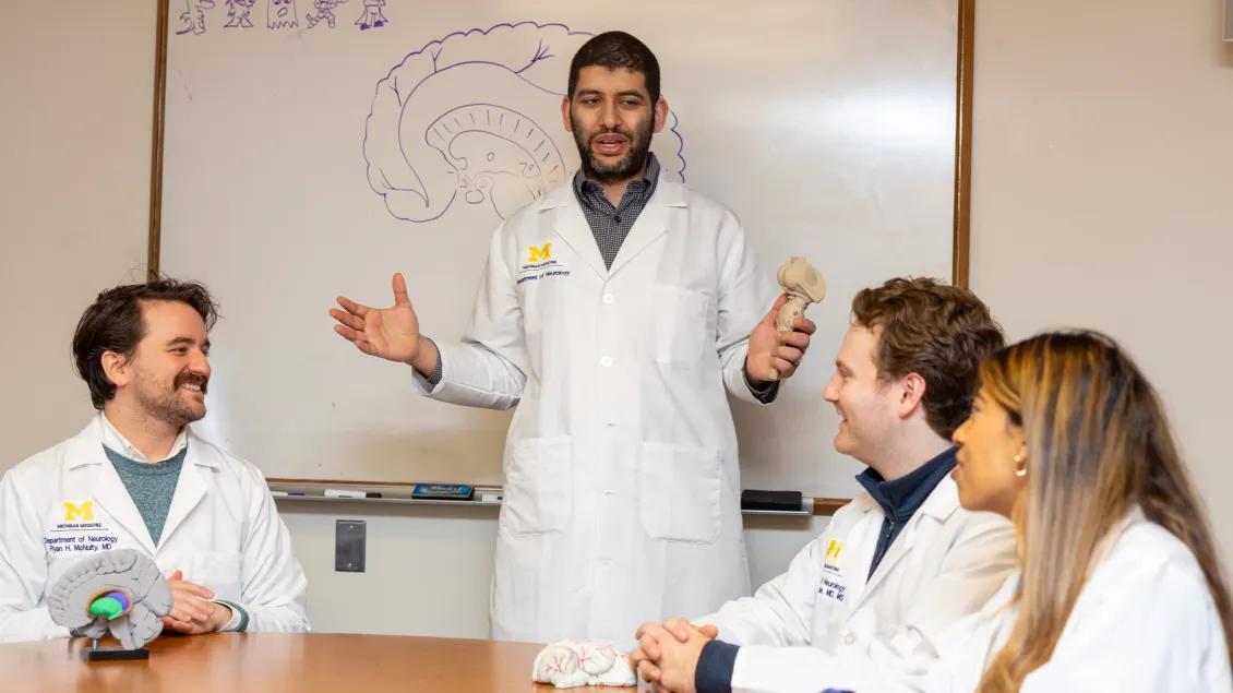 Neurology Residents Gather together in the conference room 