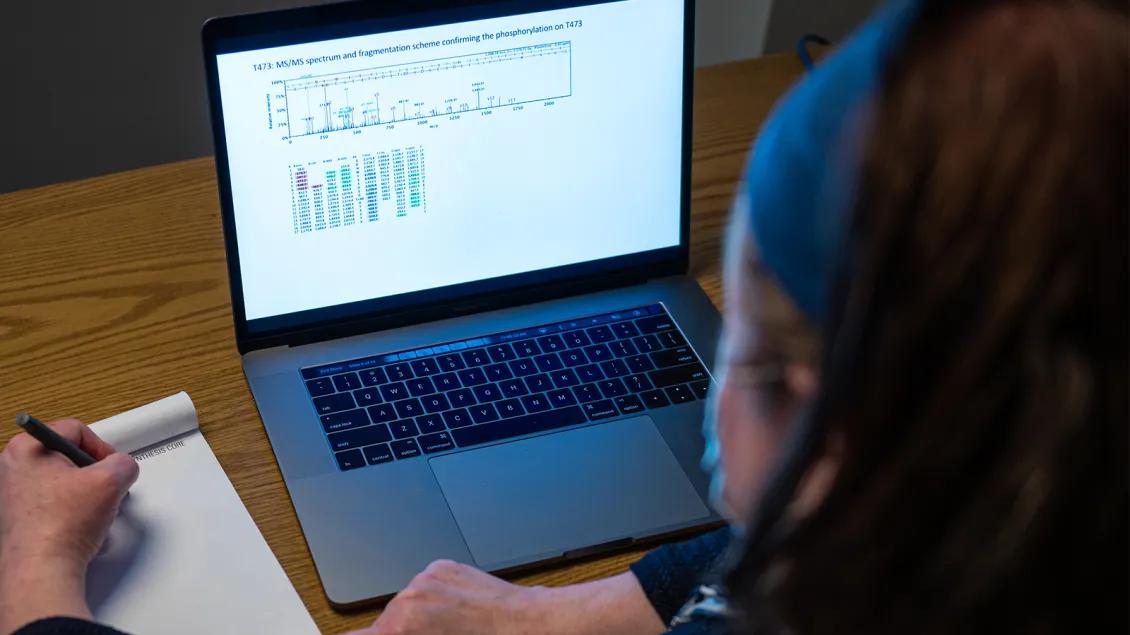 close up of laptop screen with scientific data displayed