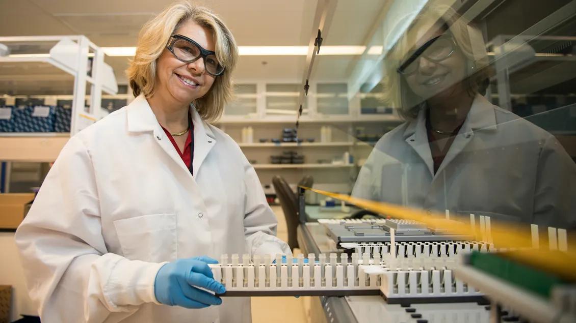 Photo of CBR staff member processing biospecimen