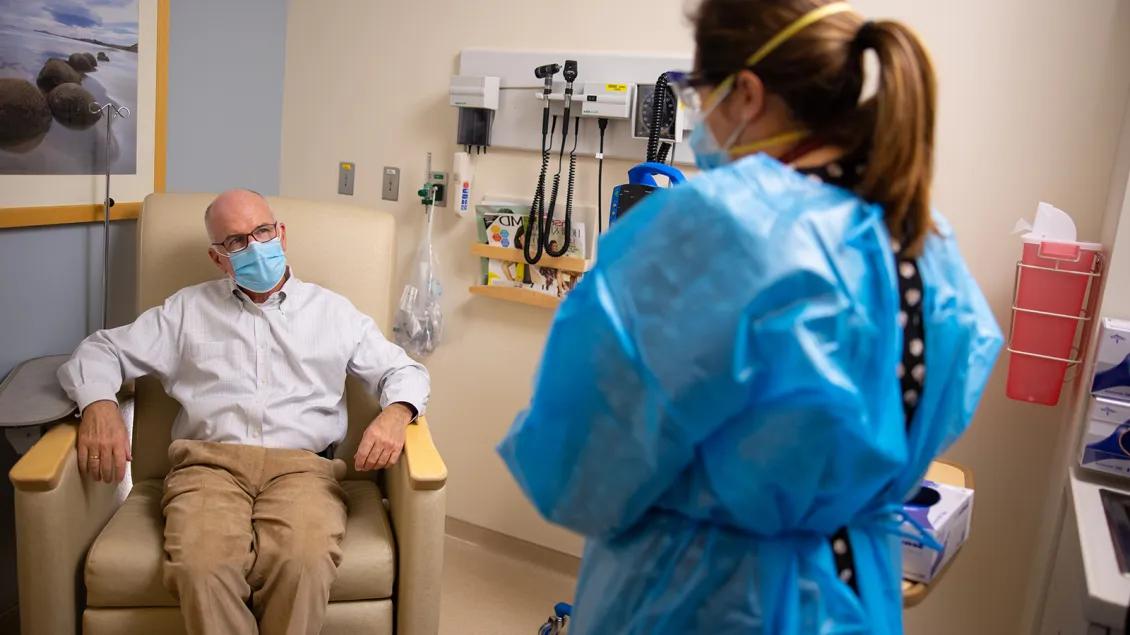 doctor speaking with patient