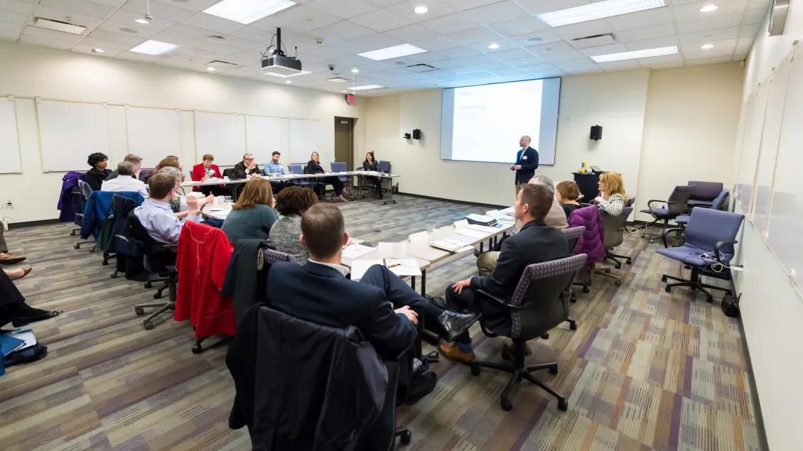 A speaker addressing a class at NCRC