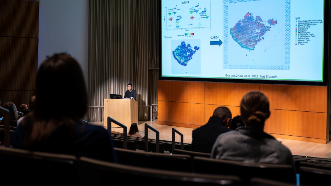 Presenter in the auditorium at the Skin Bio Symposium 2024