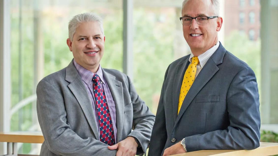 two men, K12 Career Development Program directors, posing for photo