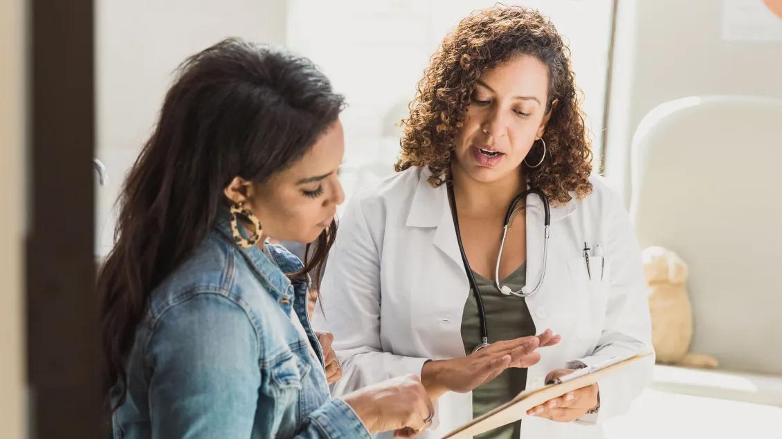 doctor with patient talking