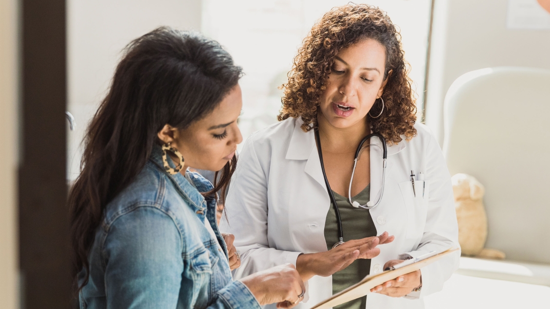doctor with patient talking