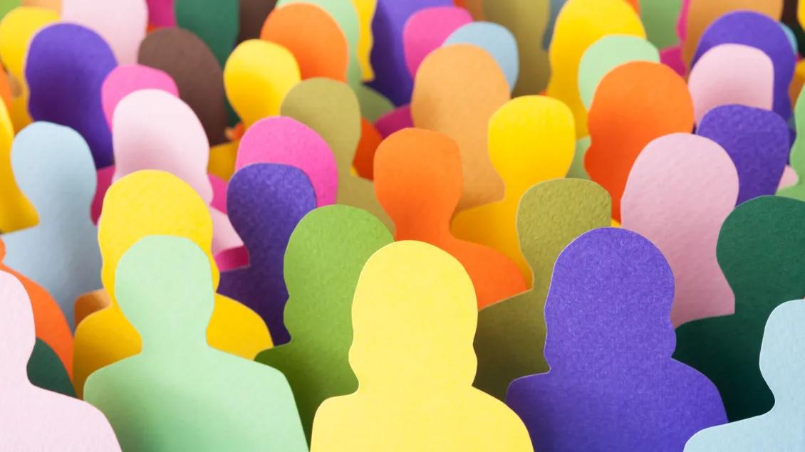 Multi-colored silhouette cutouts of people
