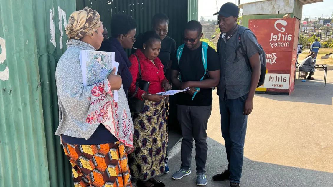 health workers from the Zambia Cohort for Healthy Aging & Dementia talking on the street