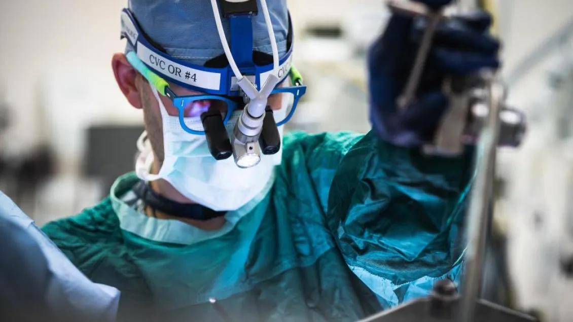 A surgeon performing a procedure in the CVC