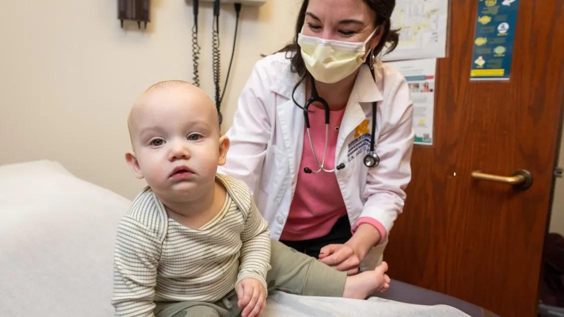 Infant being examined in food allergy clinic