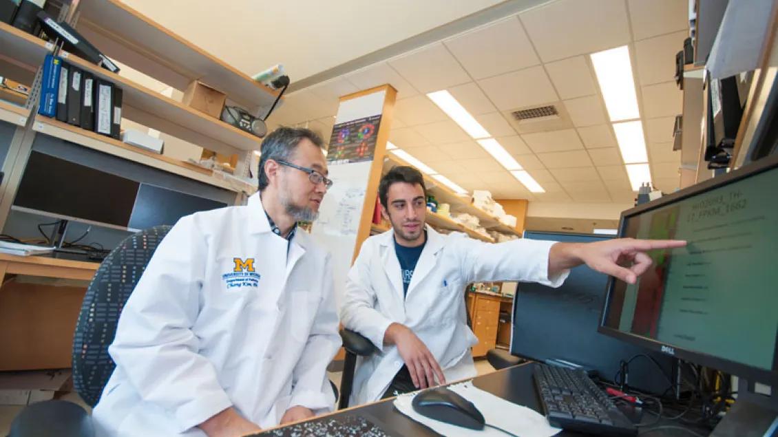 Two scientists in a food allergy research lab