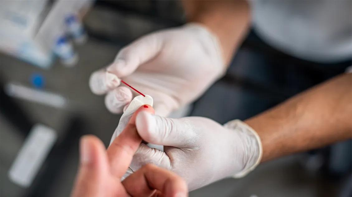 close-up of finger blood test
