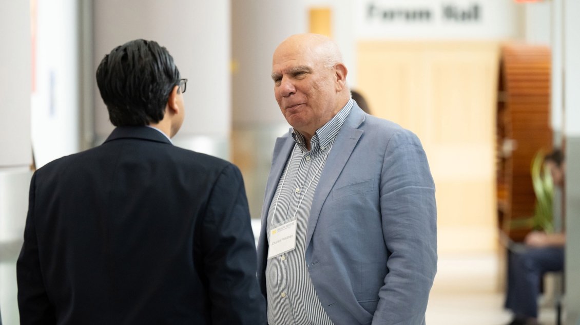 faculty engaging in corridor