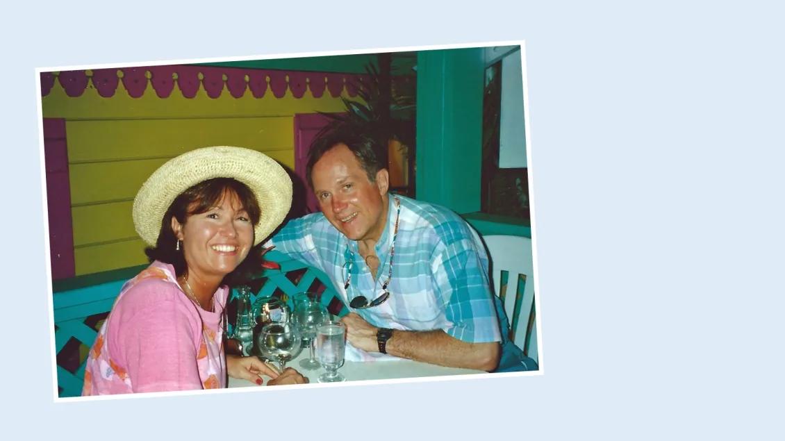 a woman wearing a hat on vacation with her husband 