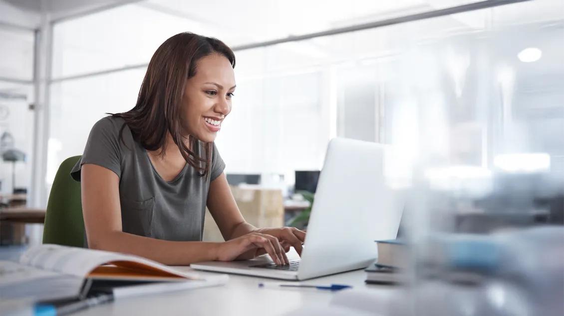 woman working on laptop in office