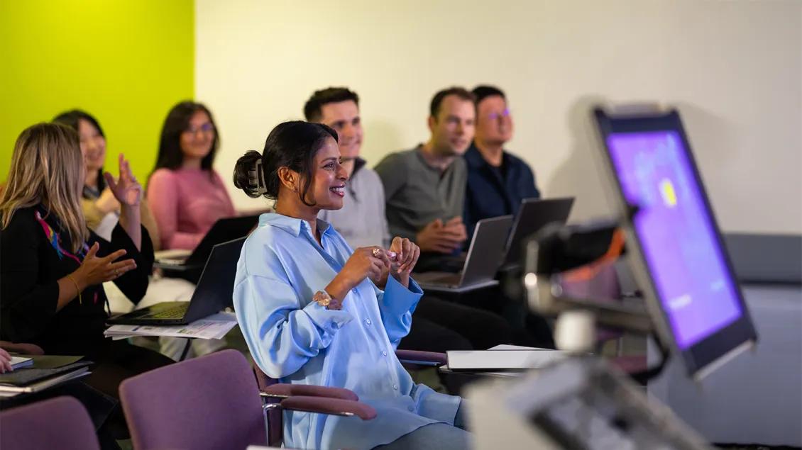professionals watching a presentation