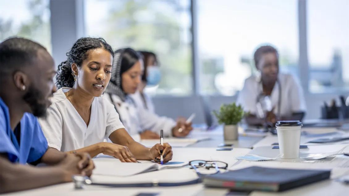 group of medical professionals in an education class