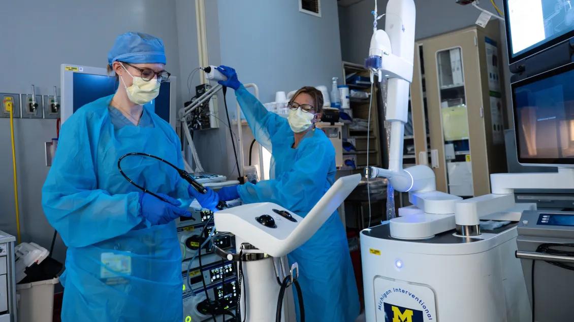 Pulmonology team using medical equipment