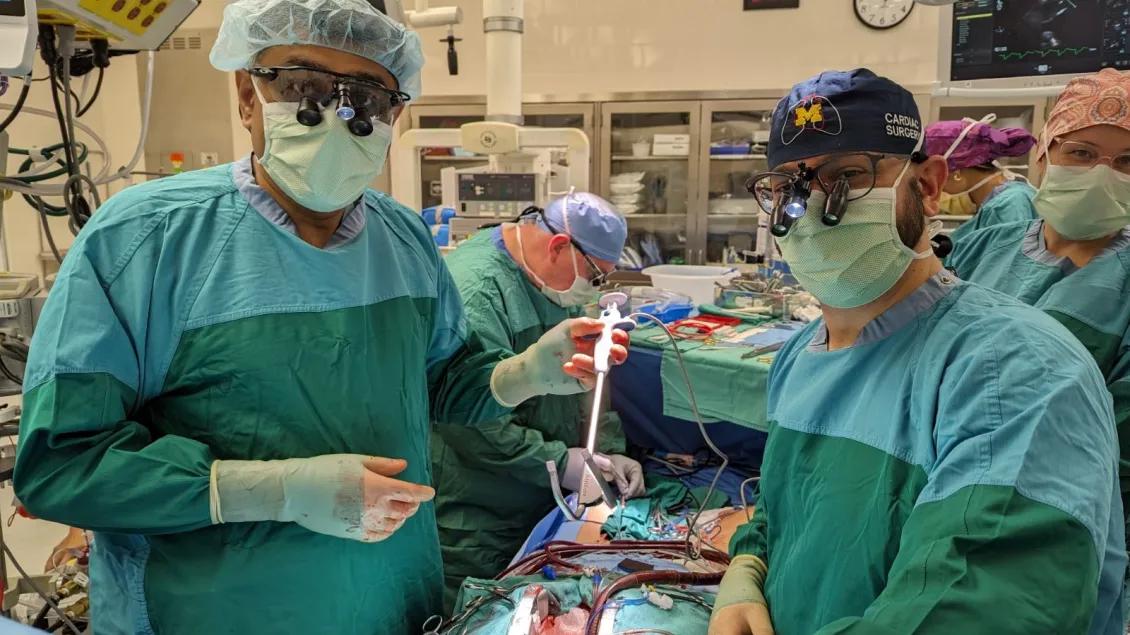 Fellows perform surgery