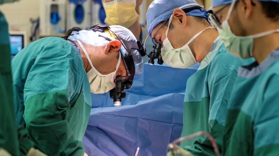 A few male cardiac surgeons work in the OR