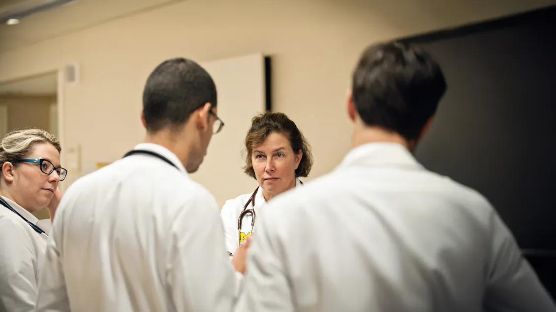 clinical staff talking in a group