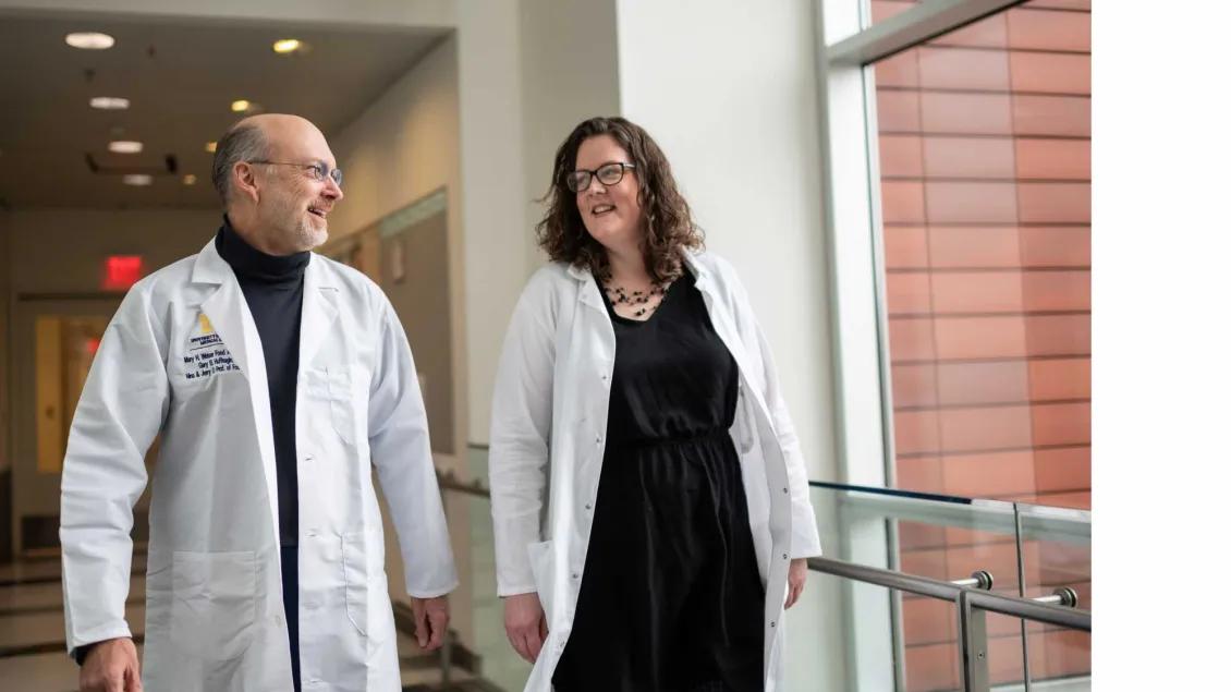 Drs. Jessica O'Konek and Gary Huffnagle at the Biomedical Science Research Building