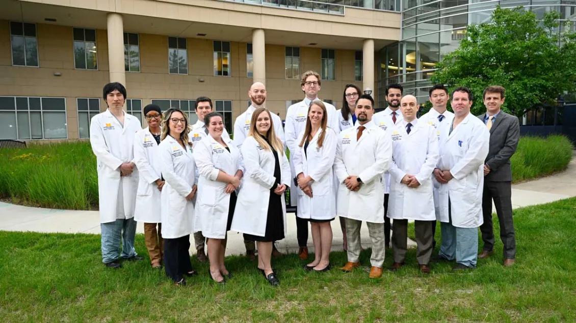 2024 cardiac surgery graduates pose for a group photo