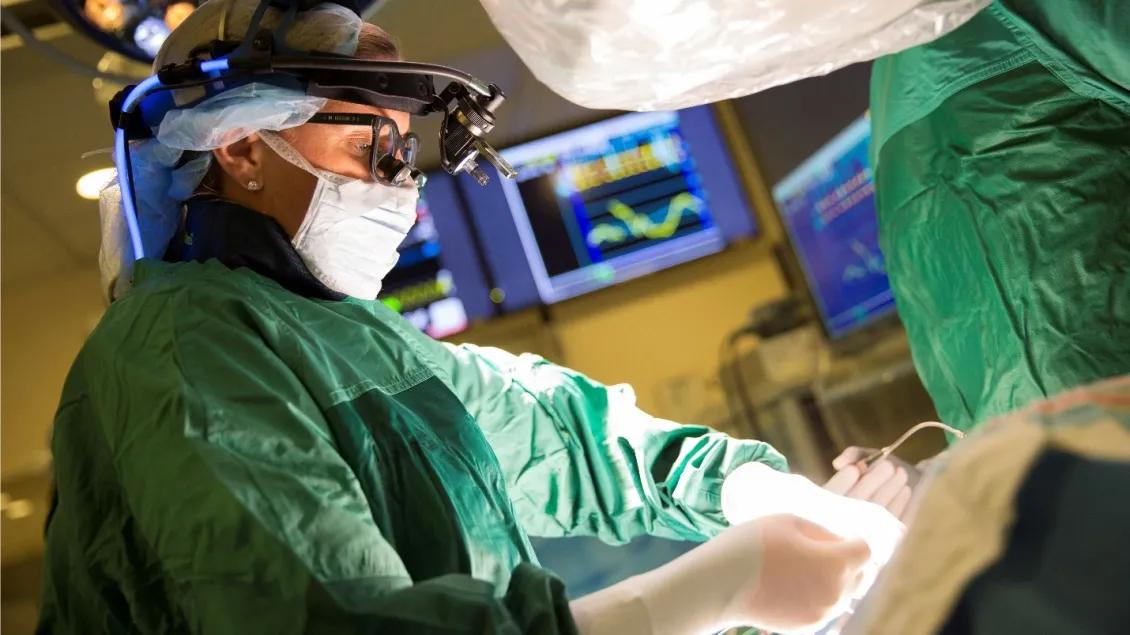 A doctor performs surgery in the operating room