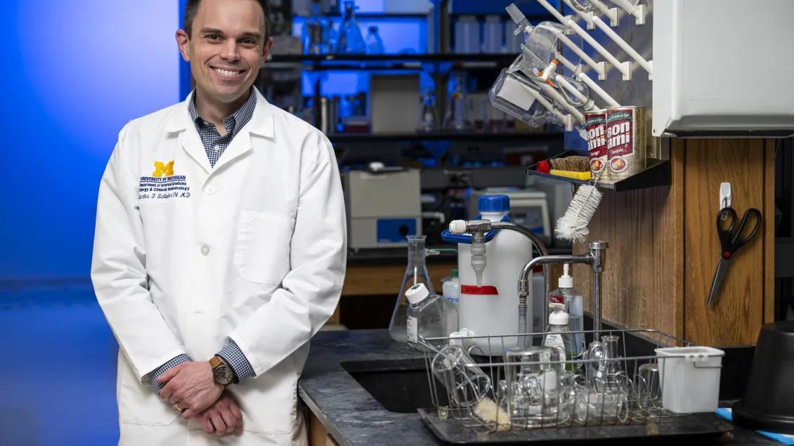 Charles Schuler, MD in lab