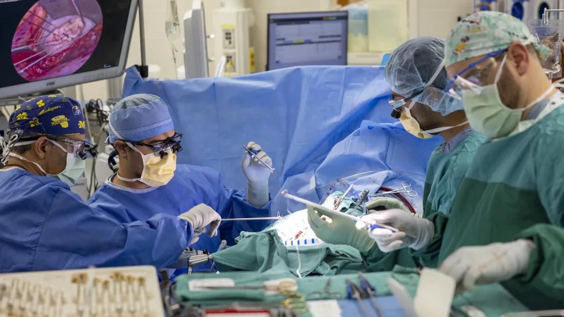 Doctors performing a surgery in an operating room