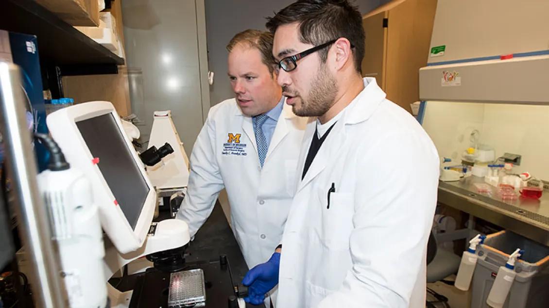 Dr. Timothy Frankel and technician in the lab