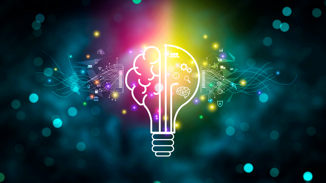 Colorful digital illustration of a glowing light bulb with a brain design inside it. The left half shows a stylized brain with circuit patterns, while the right half features icons such as gears, magnifying glass and graph. The background is dark with glowing bokeh and light trails, adding a dynamic, futuristic feel.