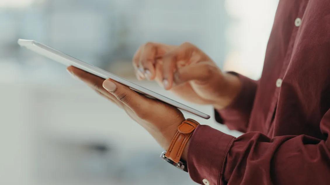 Close up of someone using a tablet
