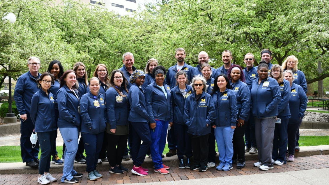 Large Group photo of people wearing Michigan Blue