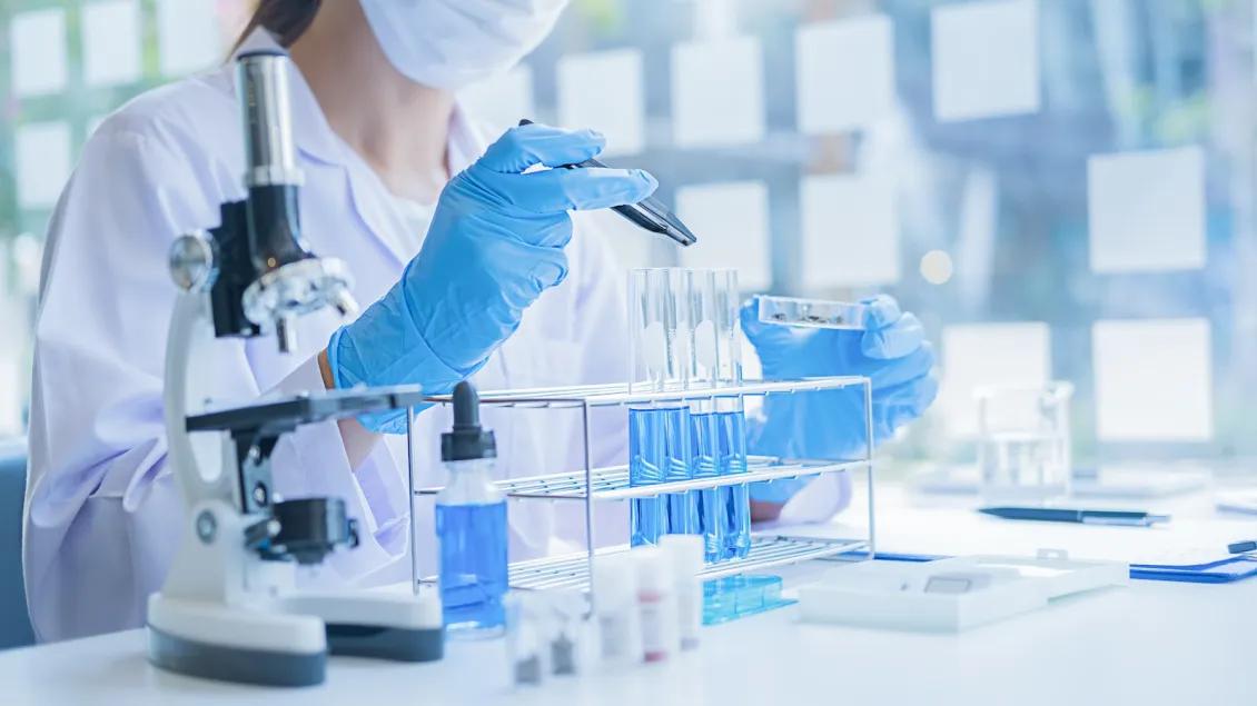 Person working with equipment in lab