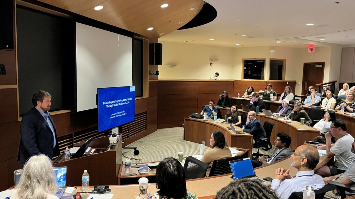 A group of people in a lecture room