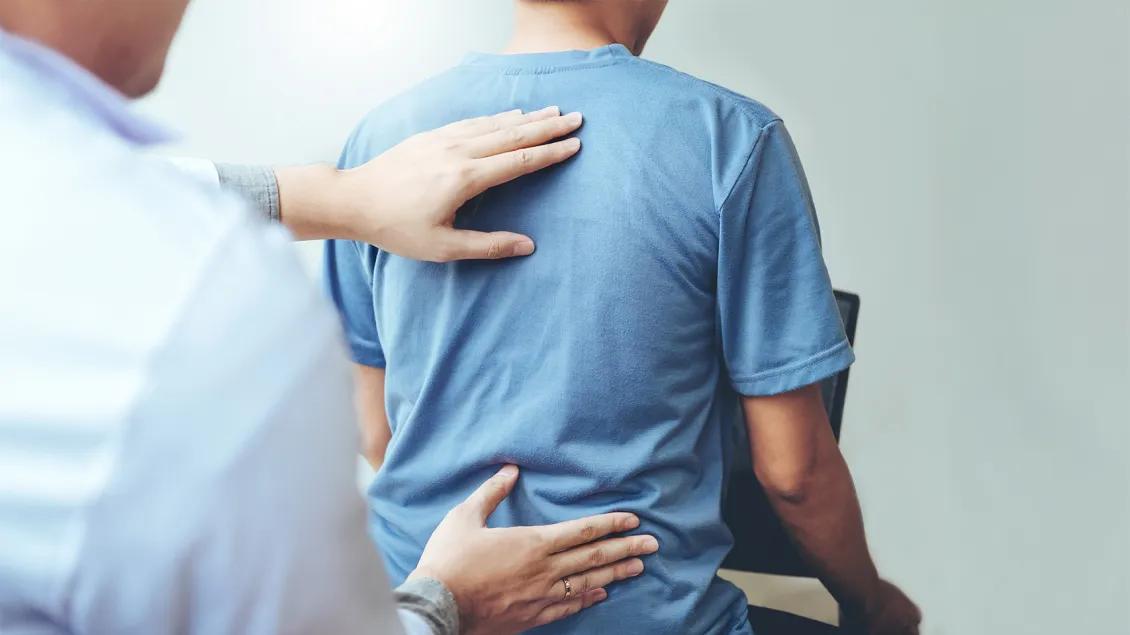 doctor treating a patient
