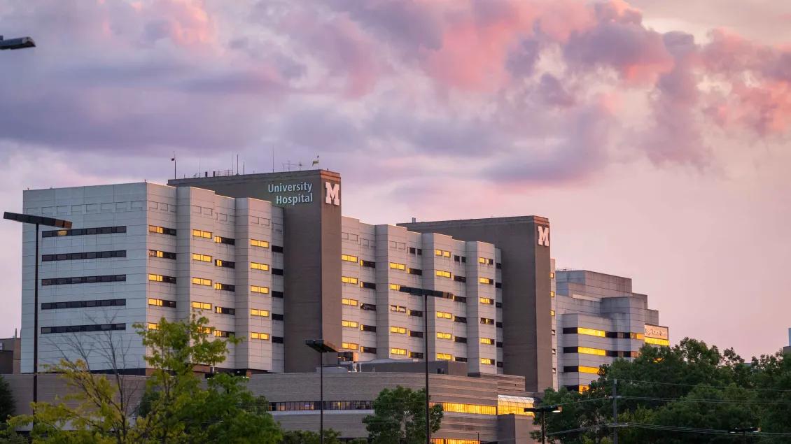 University Hospital building with sunset