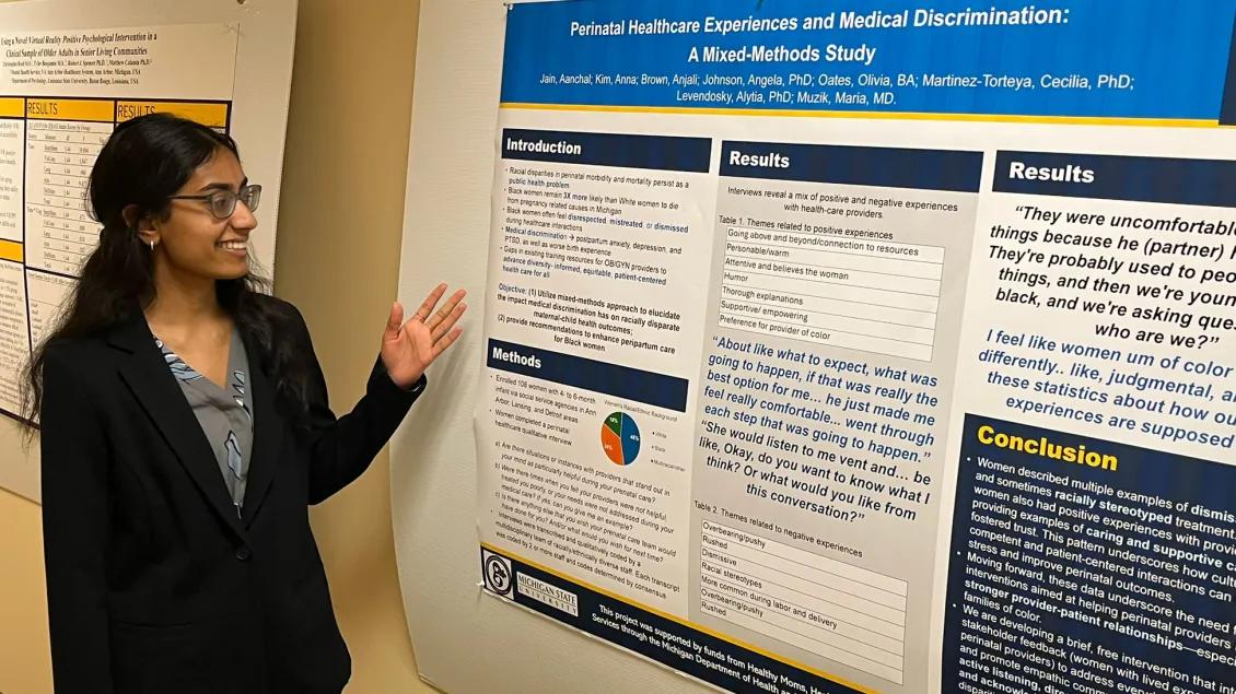 Psychiatry learner presenting research poster