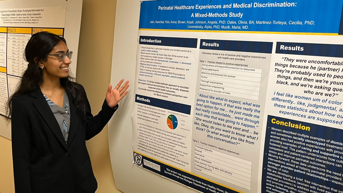 Psychiatry learner presenting research poster
